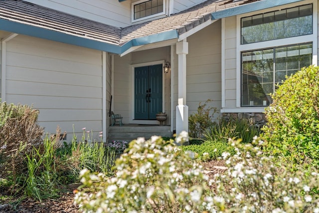 7350 Rasmussen Way, Rohnert Park, CA 94928 - property entrance with stone siding and a shingled roof