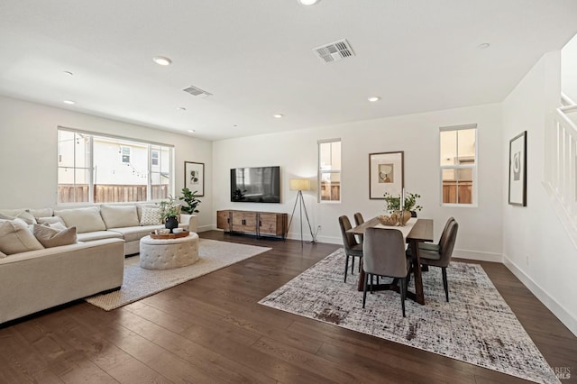 dining area with visible vents, baseboards, dark wood-style floors, and recessed lighting