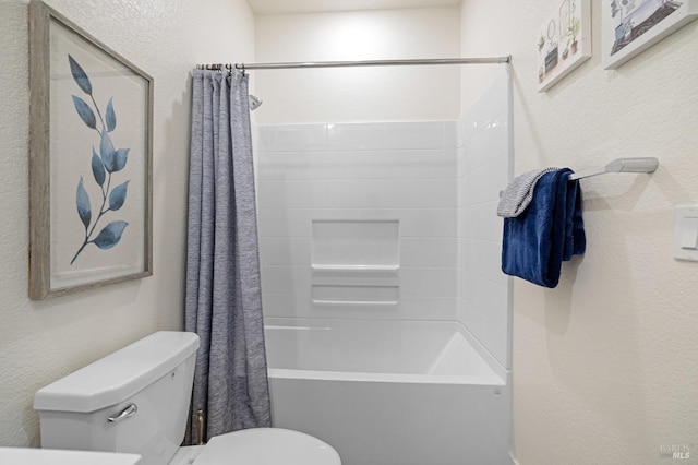bathroom with shower / bathtub combination with curtain and toilet