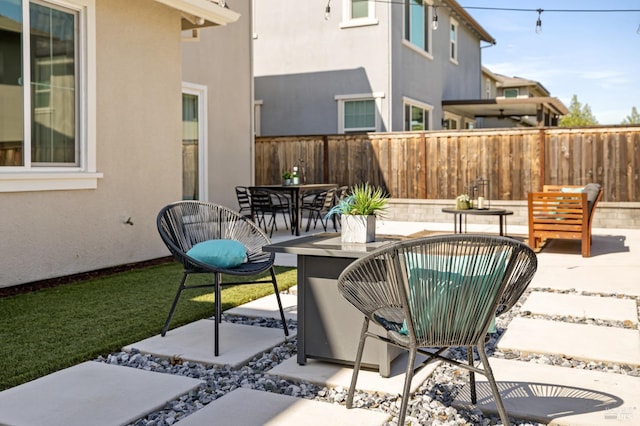2428 Periwinkle Pl, Fairfield, CA 94533 - fenced backyard with a patio area and outdoor dining space