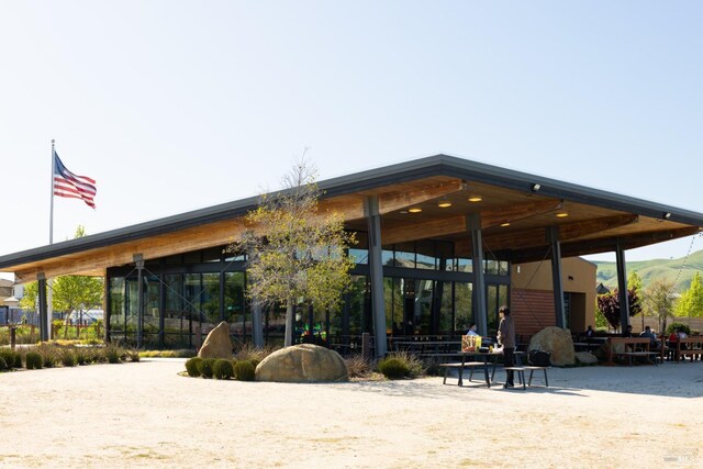 view of property's community with a carport
