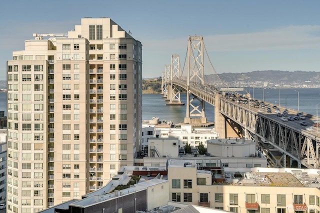 view of city with a notable bridge and a nearby body of water
