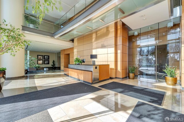 welcome area featuring a high ceiling