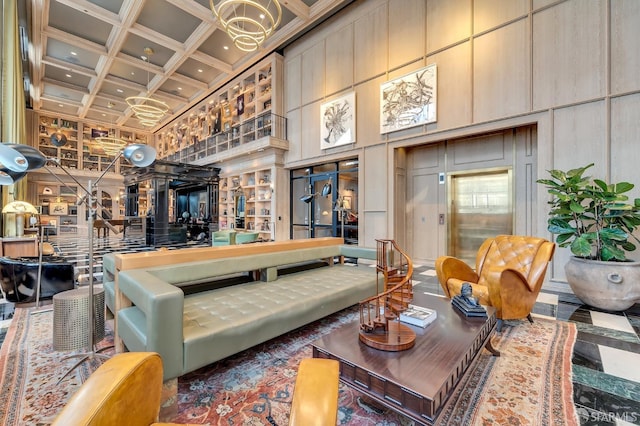 community lobby with a high ceiling, coffered ceiling, beamed ceiling, and recessed lighting