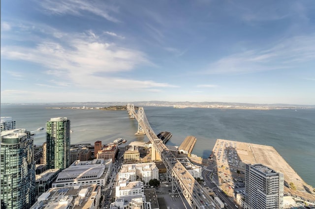 view of urban area with a large body of water