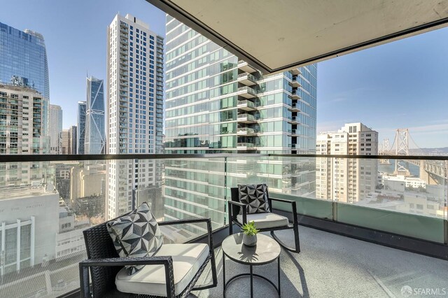 balcony featuring a view of city