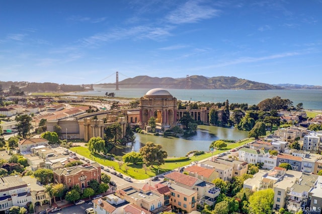 aerial view of a water and mountain view and a notable bridge