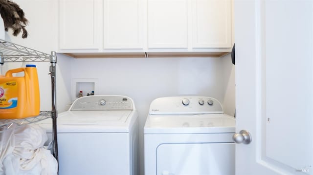 clothes washing area with washer and dryer