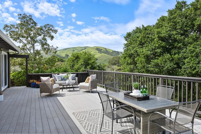 15 Manor View Dr, Fairfax, CA 94930 - wooden deck with a mountain view, an outdoor living space, and outdoor dining area
