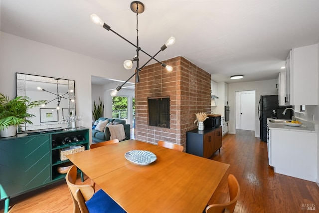 15 Manor View Dr, Fairfax, CA 94930 - dining room with a fireplace and wood finished floors