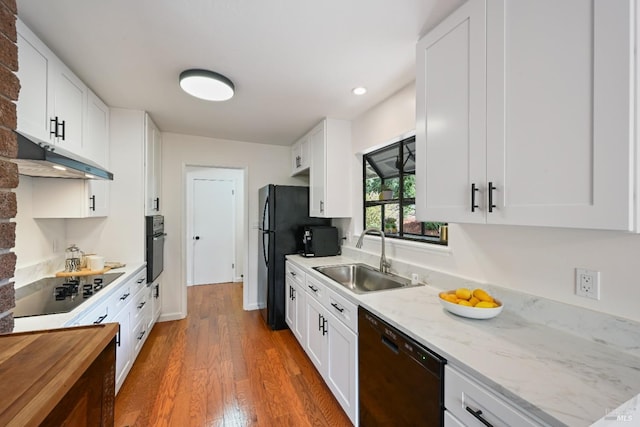 15 Manor View Dr, Fairfax, CA 94930 - kitchen featuring black appliances, wood finished floors, under cabinet range hood, white cabinets, and light stone counters