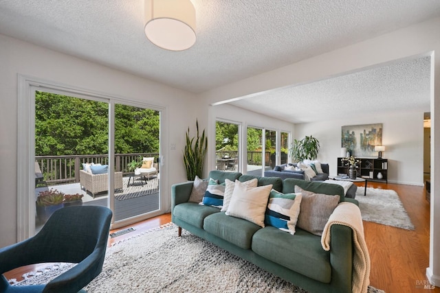 15 Manor View Dr, Fairfax, CA 94930 - living area featuring a textured ceiling and wood finished floors