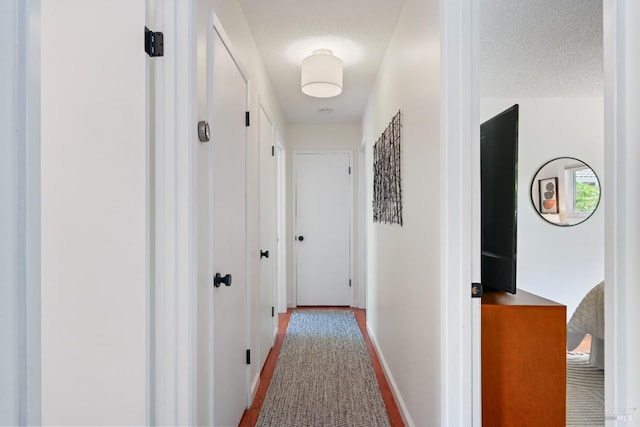 15 Manor View Dr, Fairfax, CA 94930 - hall featuring a textured ceiling and baseboards