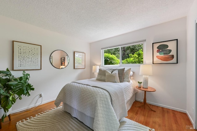 15 Manor View Dr, Fairfax, CA 94930 - bedroom featuring a textured ceiling and wood finished floors