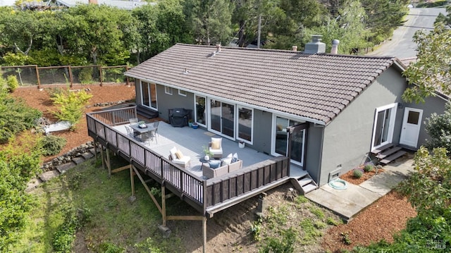 15 Manor View Dr, Fairfax, CA 94930 - back of property featuring stucco siding, a tile roof, fence, and a deck