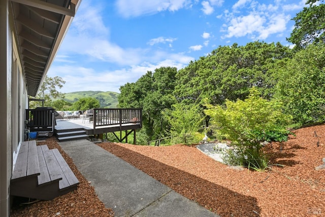 15 Manor View Dr, Fairfax, CA 94930 - view of yard featuring a deck with mountain view