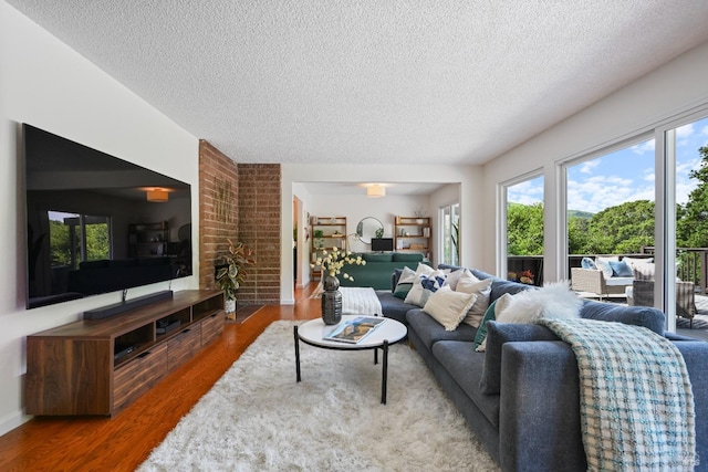 15 Manor View Dr, Fairfax, CA 94930 - living room with wood finished floors, a textured ceiling, and a healthy amount of sunlight