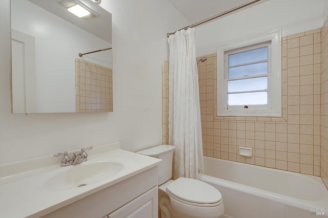 bathroom featuring toilet, vanity, and shower / bath combination with curtain