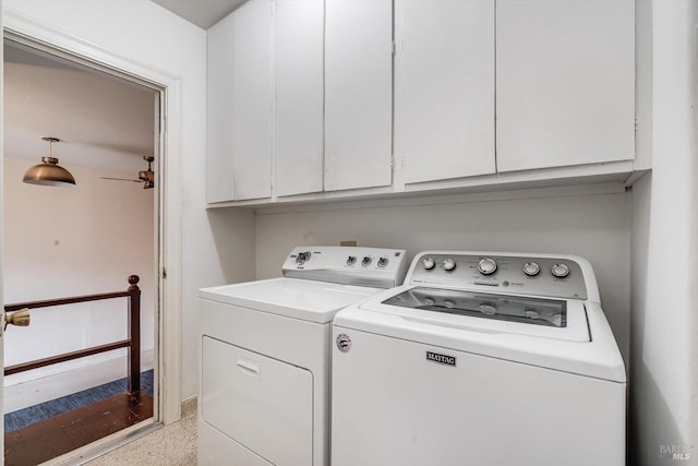 laundry area with cabinet space and washing machine and dryer