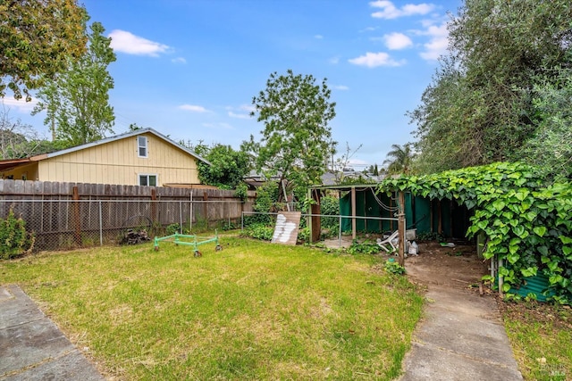 view of yard featuring fence