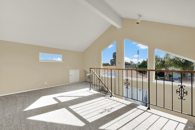 bonus room featuring carpet, vaulted ceiling with beams, and baseboards