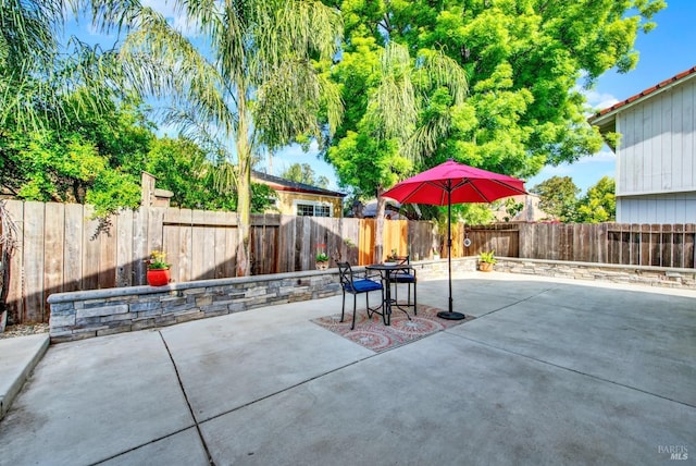 view of patio with a fenced backyard