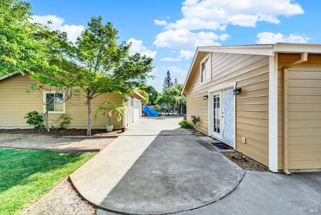 view of property exterior featuring an outdoor structure