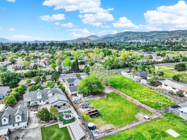 bird's eye view with a residential view and a mountain view