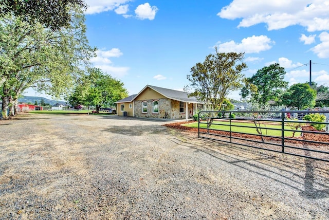 view of front of house with a gate