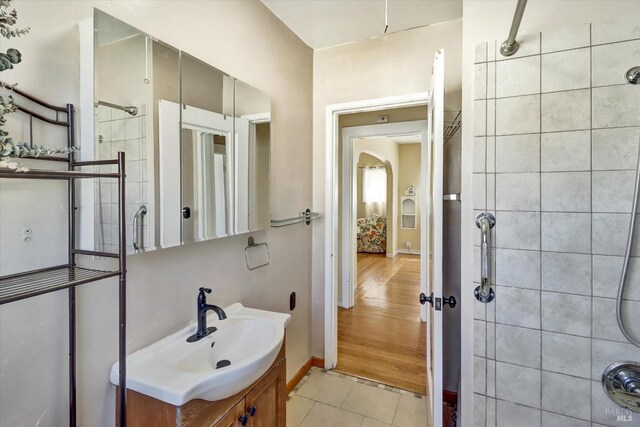 1467 Ohio St, Vallejo, CA 94590 - bathroom with vanity, tile patterned flooring, a tile shower, and baseboards