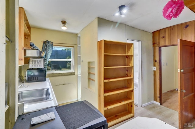 1467 Ohio St, Vallejo, CA 94590 - kitchen with a sink, light wood-type flooring, and black microwave