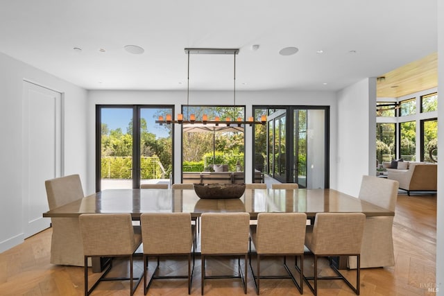dining room featuring baseboards