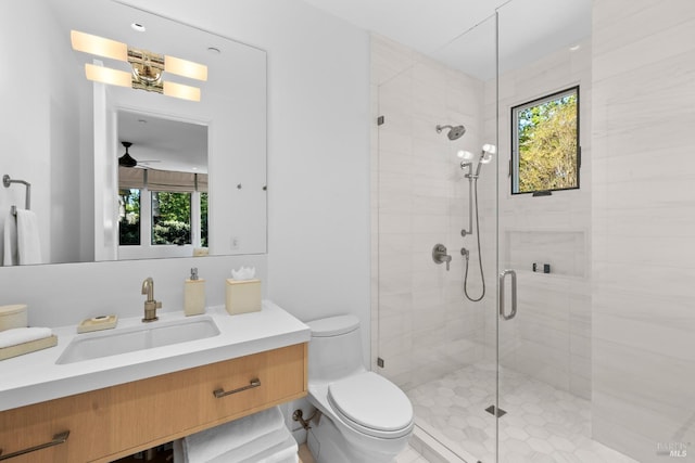 bathroom featuring a wealth of natural light and a stall shower