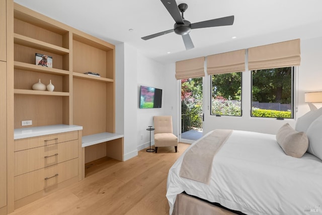 bedroom with baseboards, a ceiling fan, access to exterior, and light wood finished floors