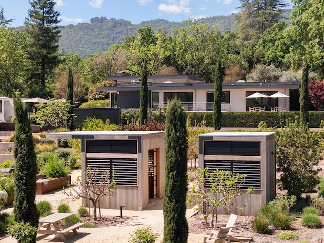 contemporary house featuring a mountain view