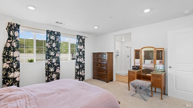 bedroom featuring recessed lighting, visible vents, and light carpet