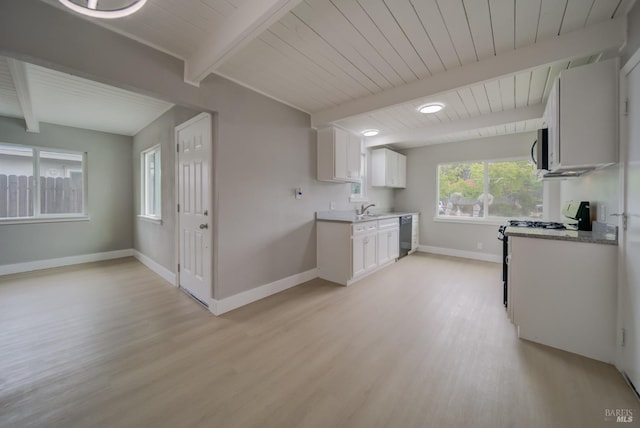 kitchen featuring beam ceiling, dishwasher, baseboards, wooden ceiling, and light wood-style floors