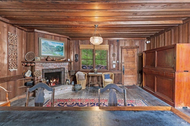 2426 S Fitch Mountain Rd, Healdsburg, CA 95448 - interior space with wood ceiling, wooden walls, a fireplace, and hardwood / wood-style flooring