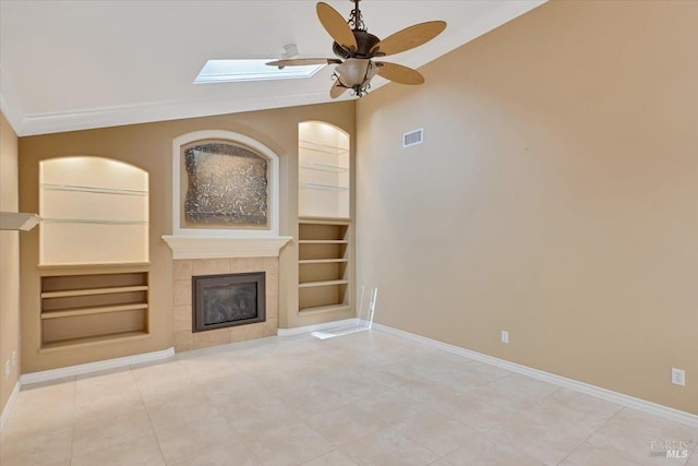 581 Werner Way, Vacaville, CA 95688 - unfurnished living room with built in shelves, baseboards, a fireplace, and lofted ceiling
