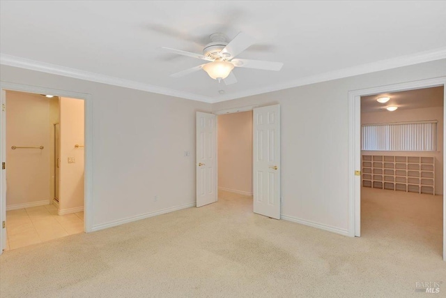 581 Werner Way, Vacaville, CA 95688 - unfurnished bedroom featuring carpet flooring, ornamental molding, baseboards, connected bathroom, and a ceiling fan