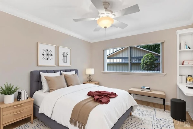 581 Werner Way, Vacaville, CA 95688 - bedroom with a ceiling fan, baseboards, wood finished floors, and crown molding
