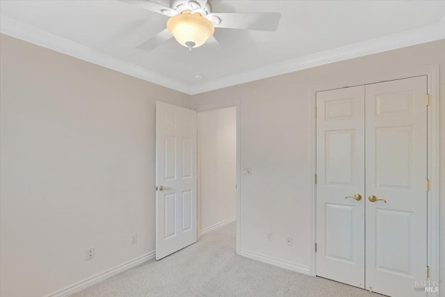 581 Werner Way, Vacaville, CA 95688 - unfurnished bedroom featuring light colored carpet, crown molding, baseboards, a closet, and ceiling fan