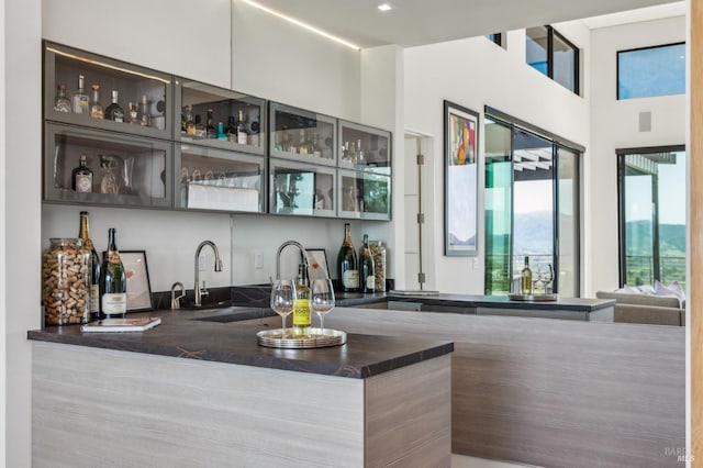 bar featuring a sink and wet bar