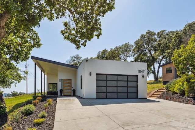contemporary house featuring stucco siding