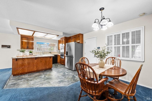 dining area with a chandelier