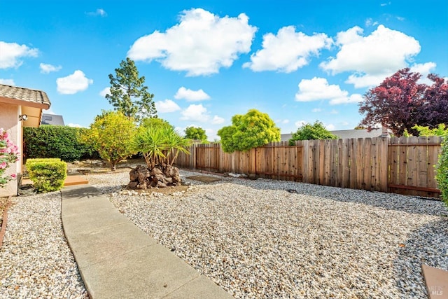 view of yard featuring fence