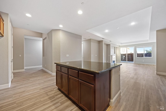 kitchen featuring recessed lighting, light wood-type flooring, and baseboards