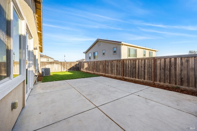 view of patio featuring a fenced backyard and central AC unit