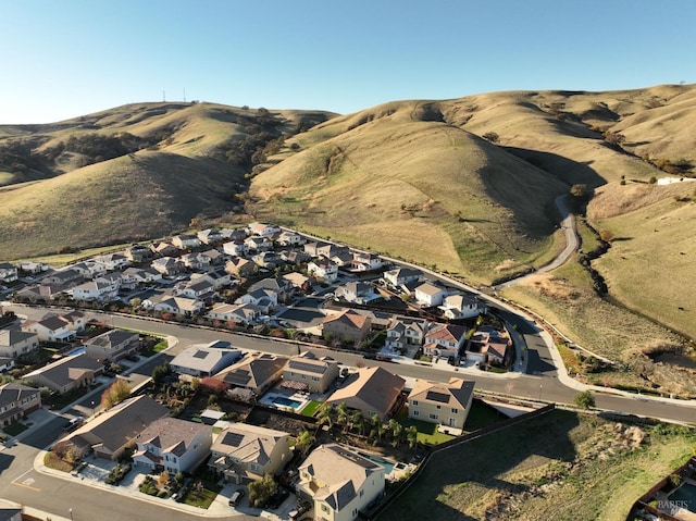 drone / aerial view with a mountain view and a residential view