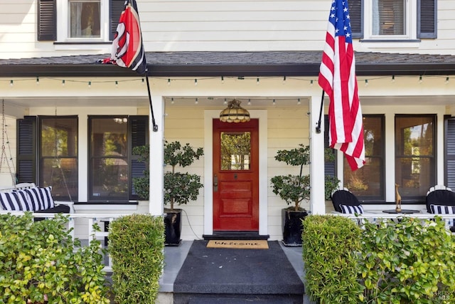 property entrance featuring a porch